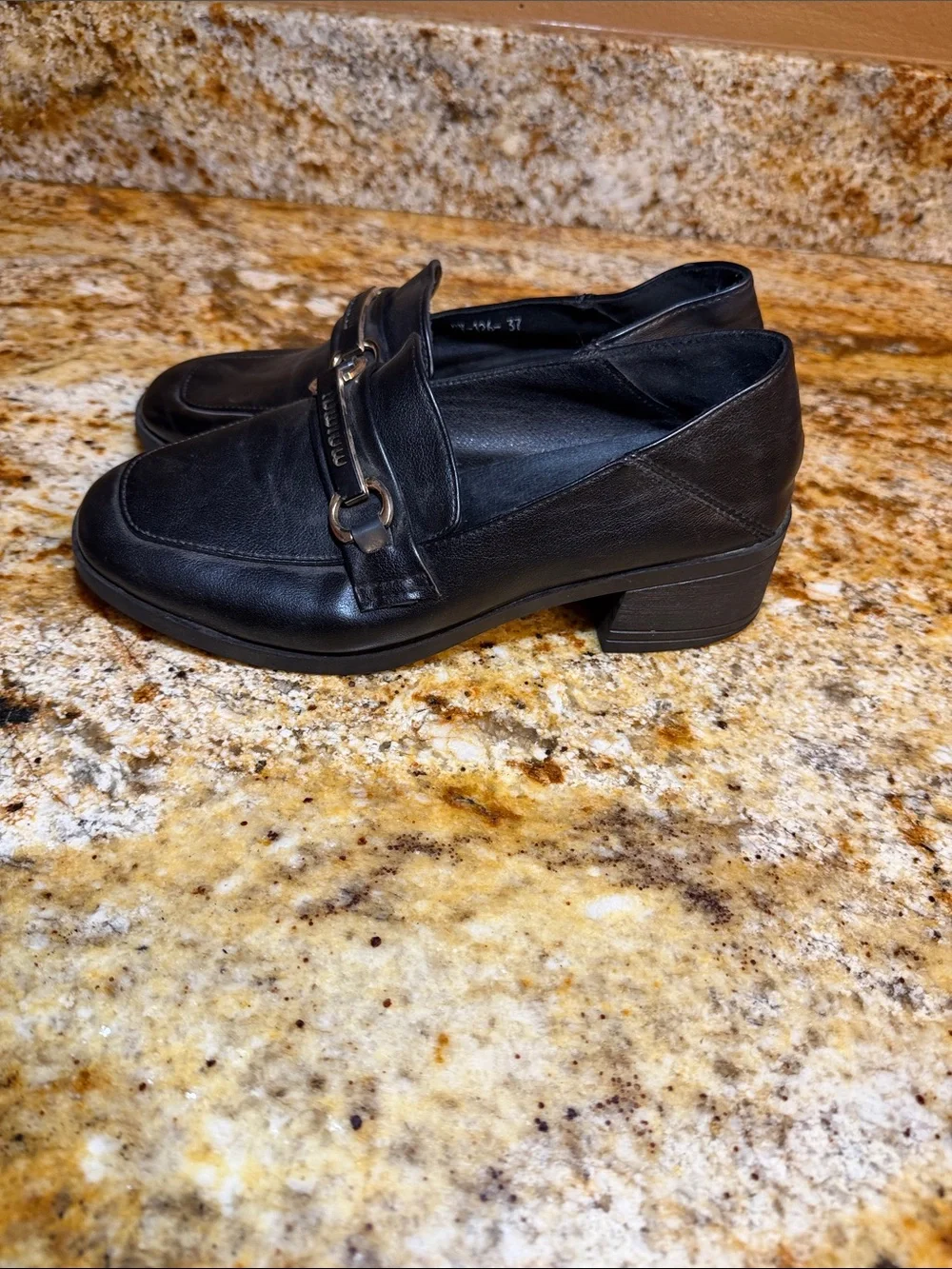 Miu Miu Black Leather Loafers with Brushed Gold Bit